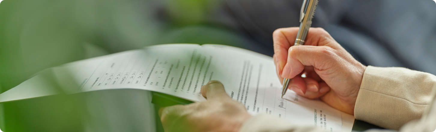 person signing paperwork